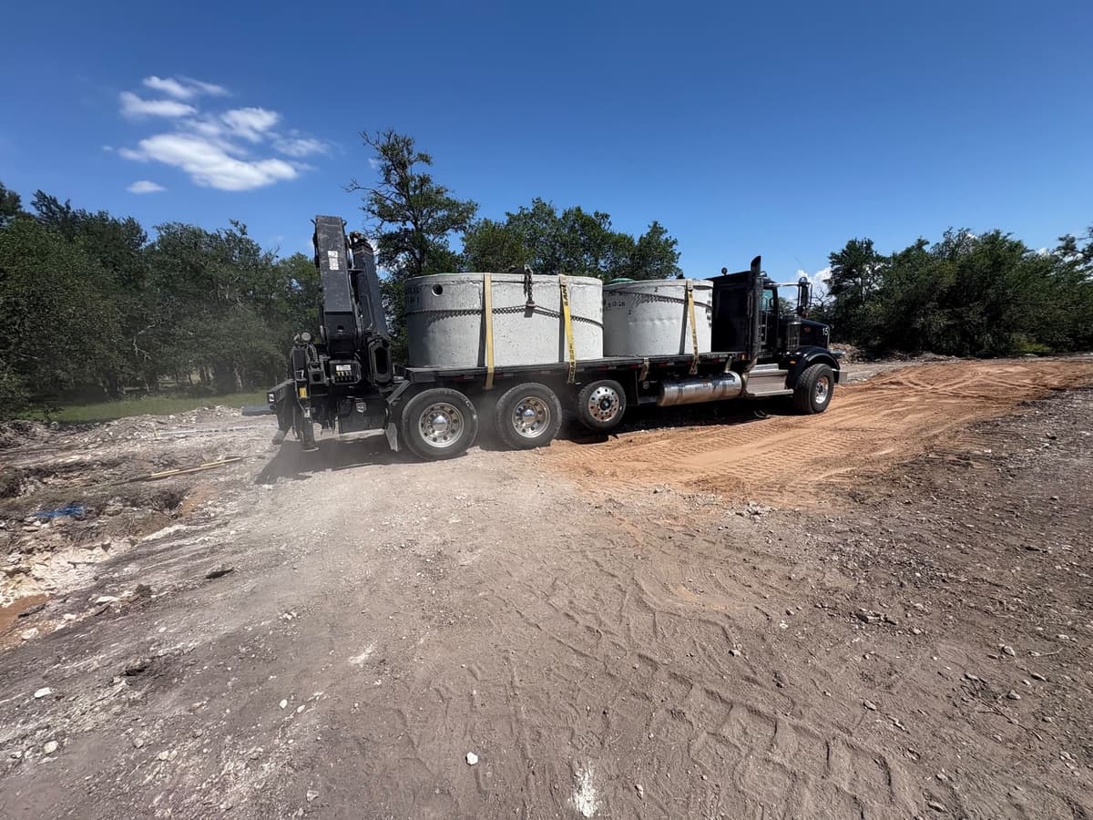 New septic system installation with excavator in Central Texas